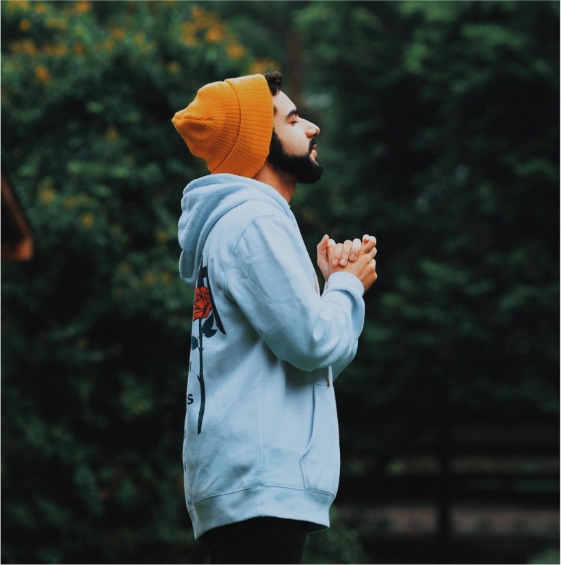 A man praying standing