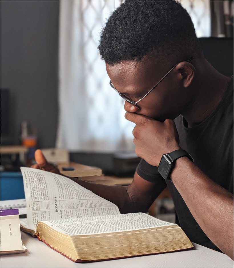 A man reading the Holy Bible